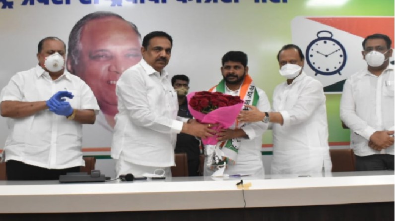 राजीव आवळे यांनी बांधले हातात घड्याळ